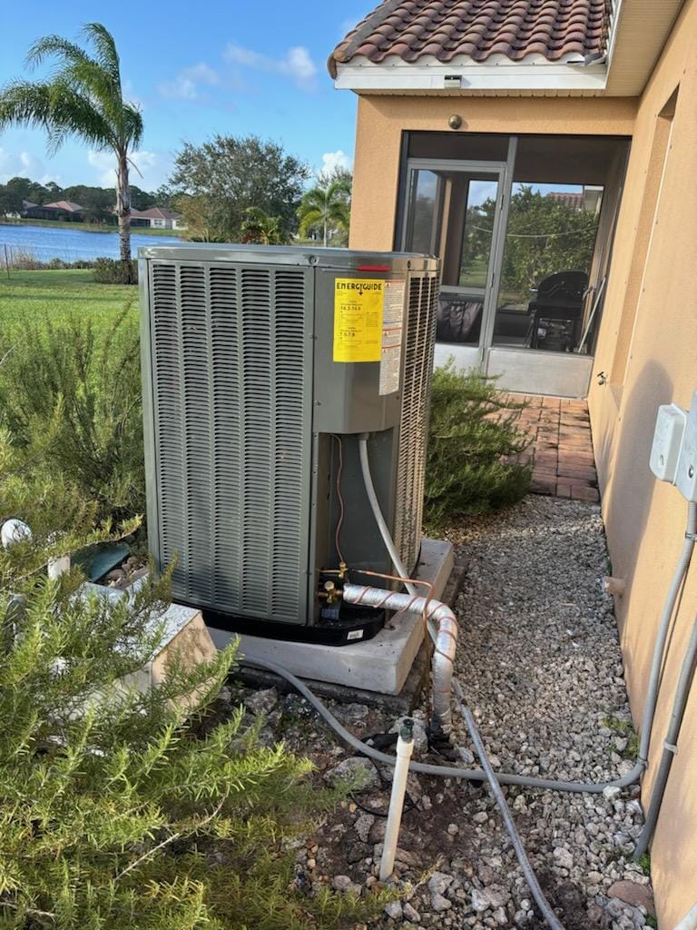 Dual condenser units installed outside Florida home