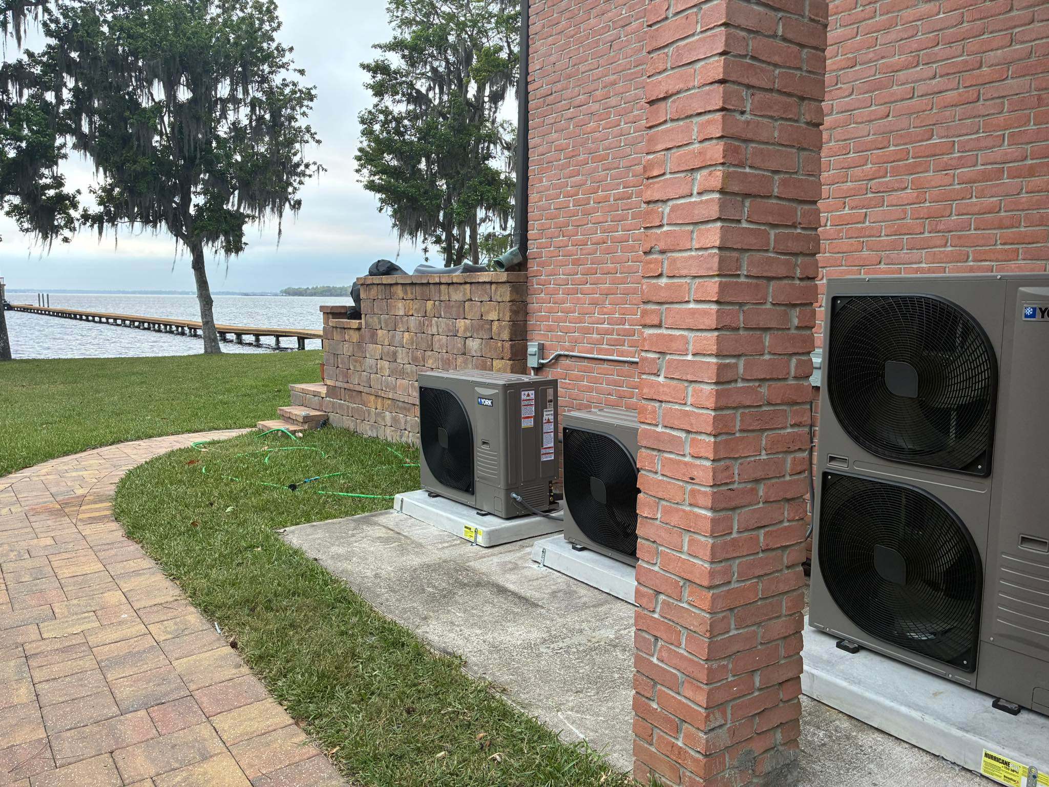 Three York condenser units at lakeside property